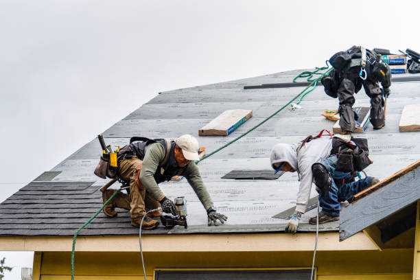 Professional Gutter Installation technician working in West Sayville, NY
